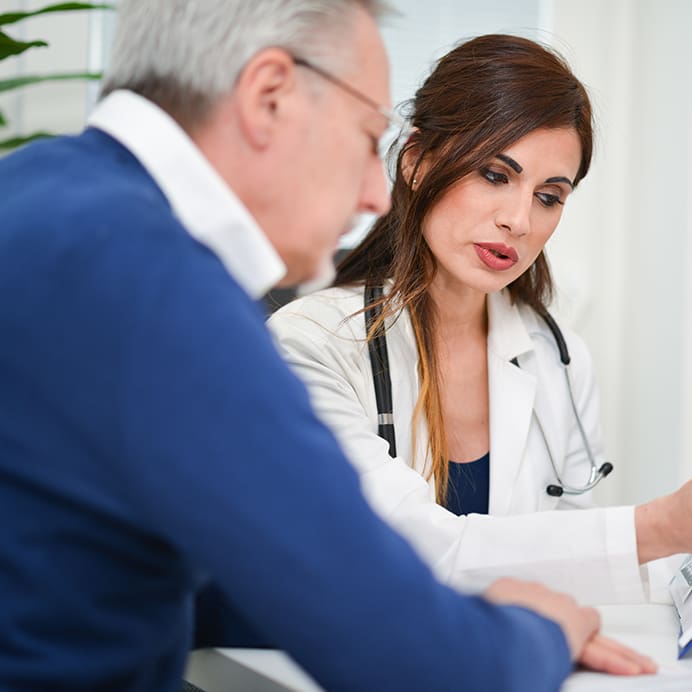 Female Doctor and male patient in consultation